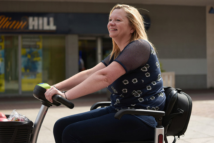 Motability Scheme customer on scooter