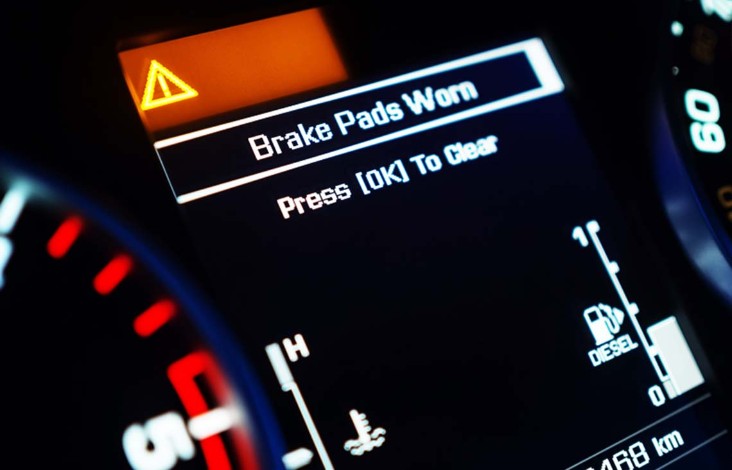 Brake pad warning light