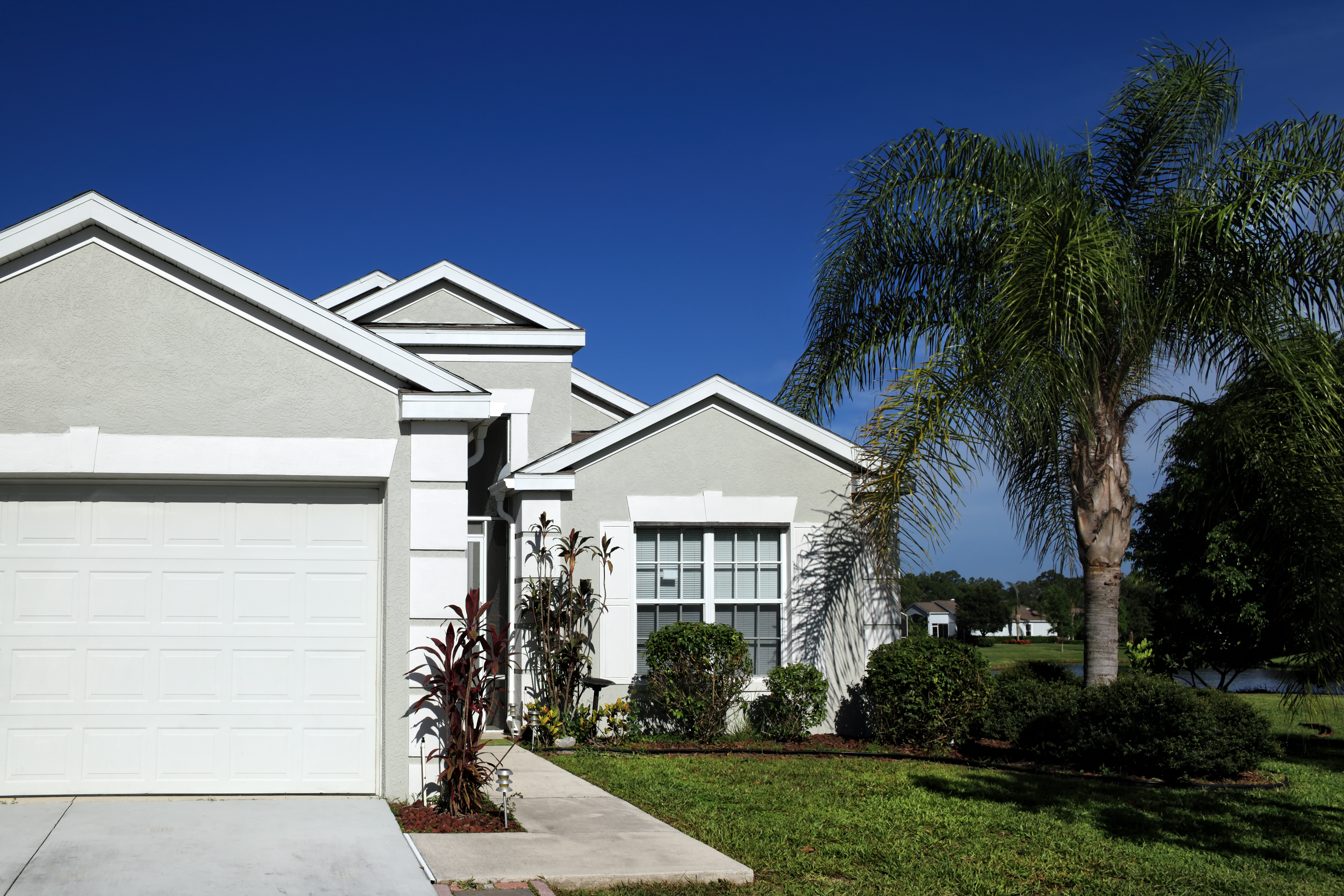 Close up family house exterior over clear blue sky