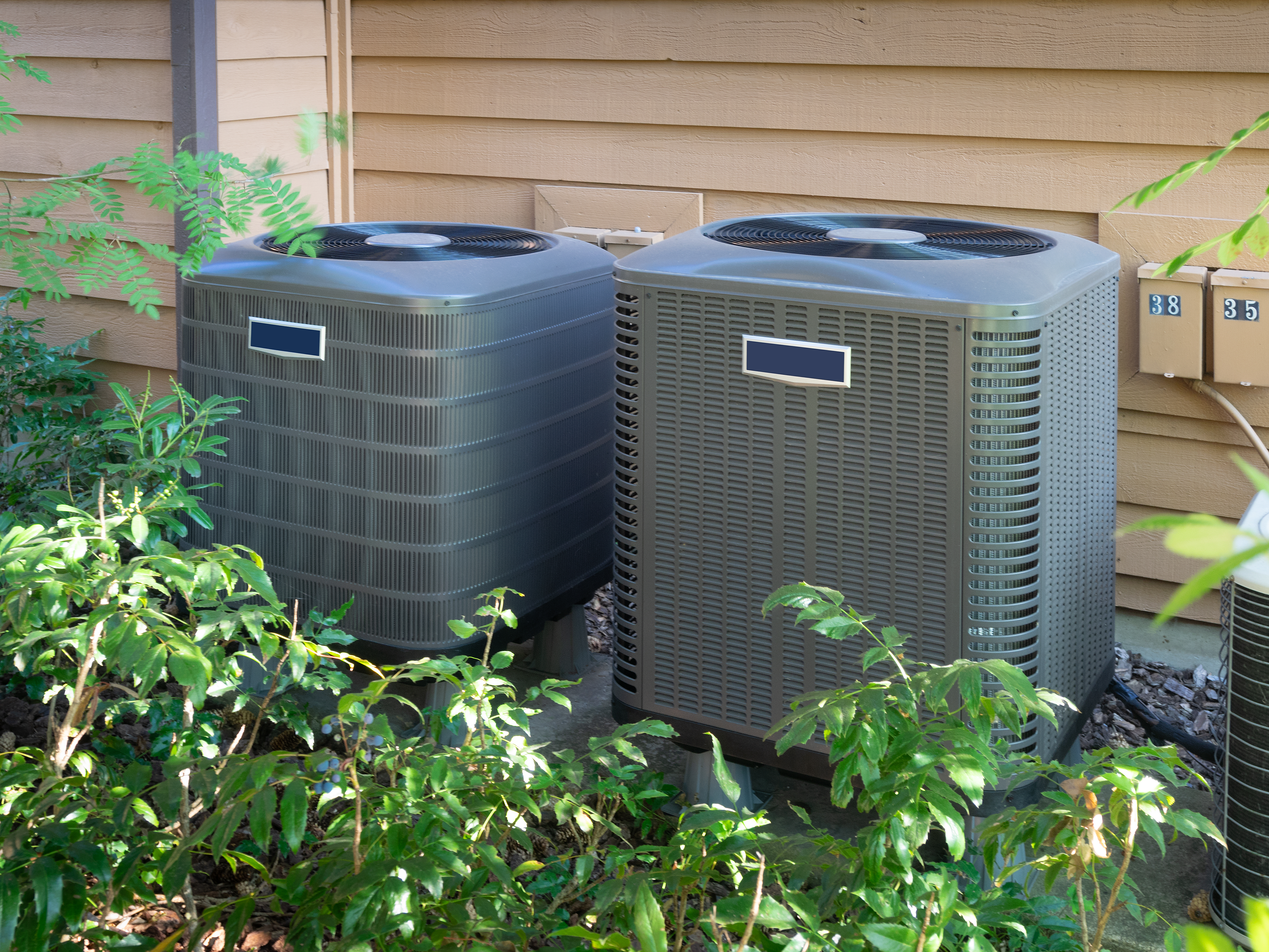 Air conditioning units outside an apartment complex