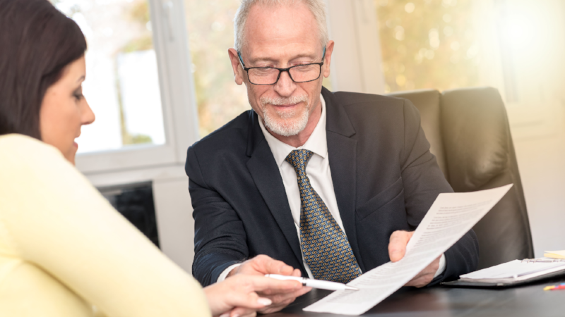 Woman meeting financial adviser in office, light effect.png