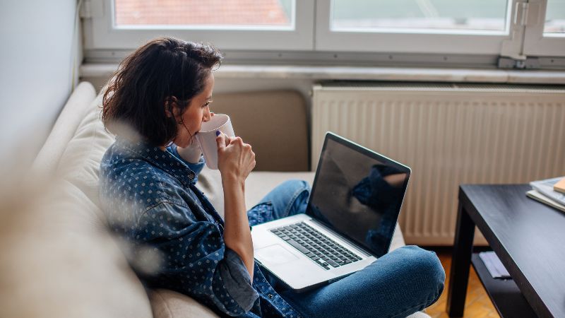 lady on sofa with laptop.jpg