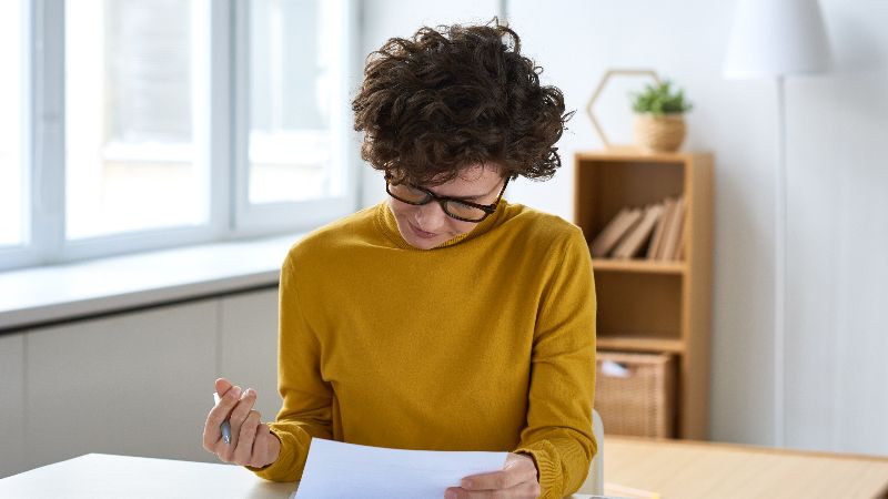 iStock-1131868327 - woman doing finances.jpg