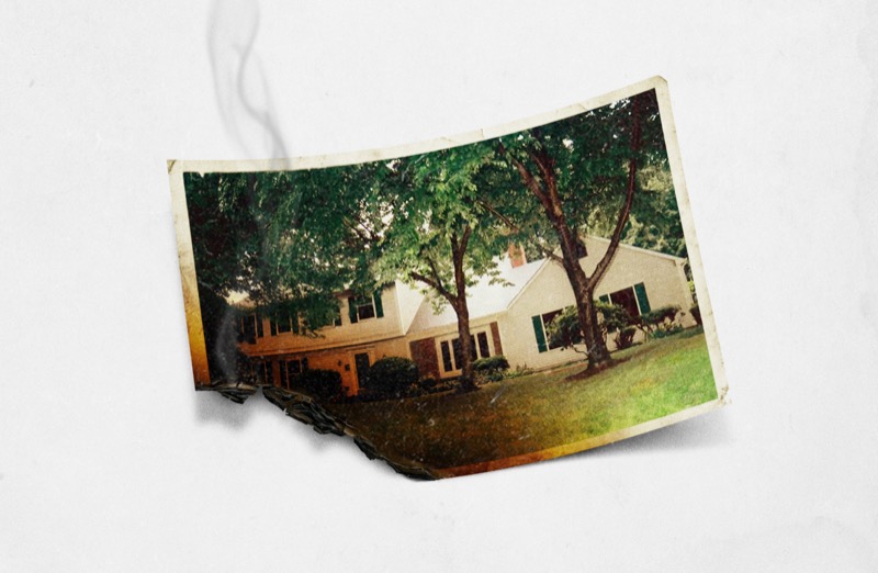 a burnt photograph sits on a white background. The photo shows a suburban home and the site of the Cheshire Murders