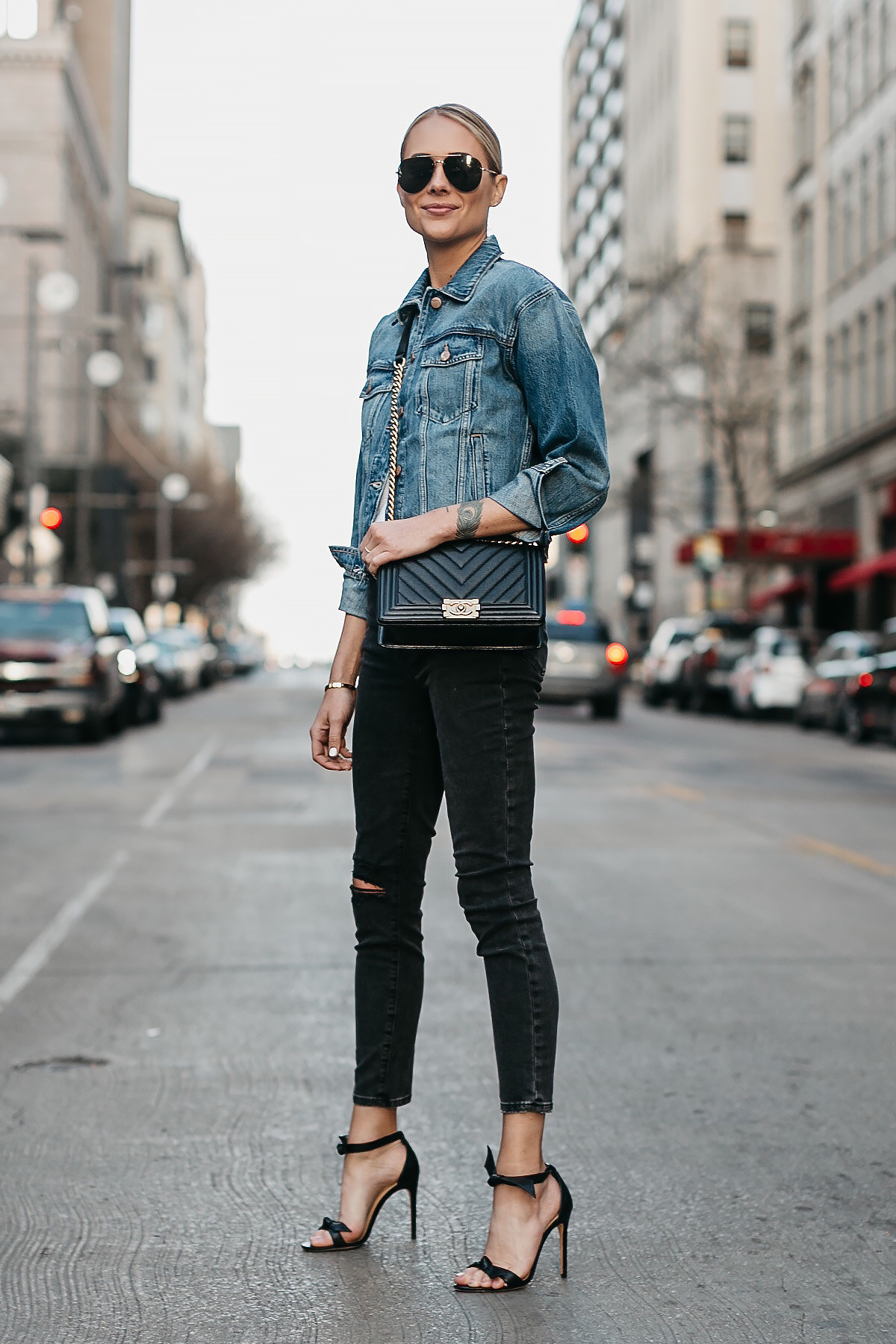 Fashion-Jackson-Joes-Jeans-Black-Ripped-Skinny-Jeans-Denim-Jacket-Chanel-Black-Boy-Bag-Alexandre-Birman-Black-Bow-Heels-Celine-Aviator-Sunglasses.jpg