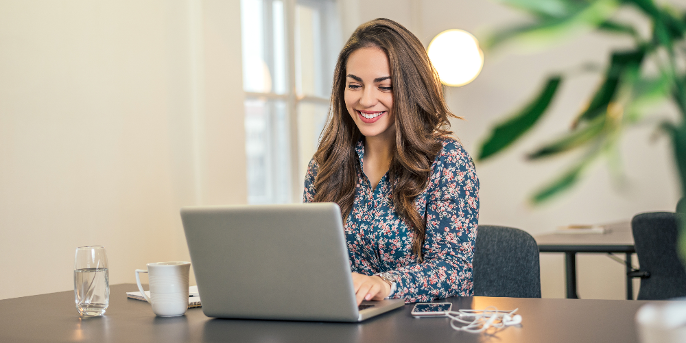 Shot of an executive businesswoman working on her laptop in office.