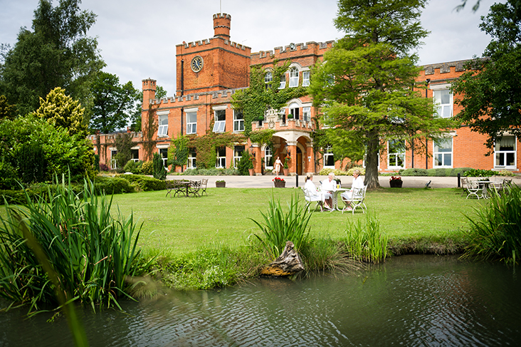 Ragdale Hall summer exterior with guests hr.jpg