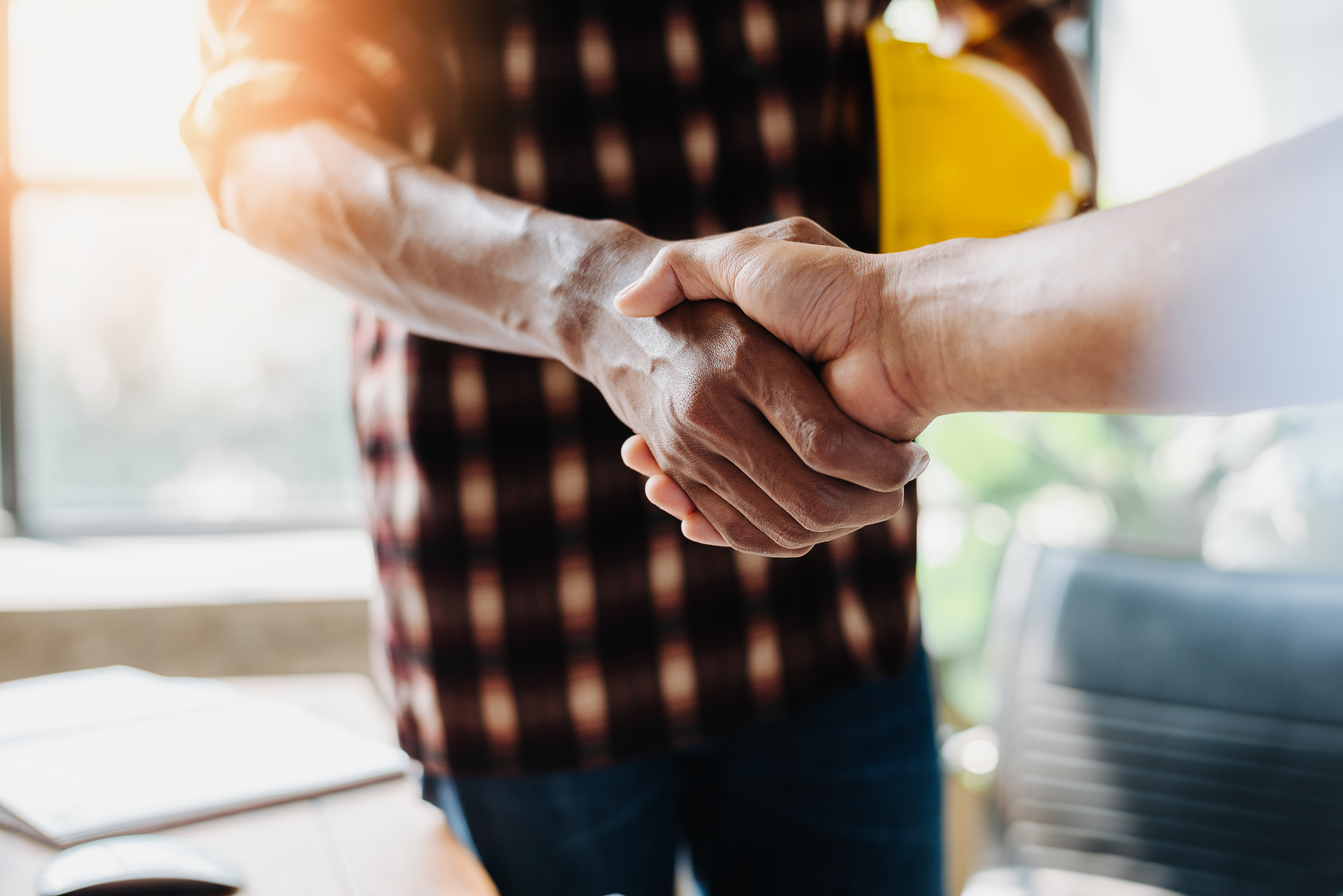 Negotiating business,Image of businessmen Handshaking,happy with work,Handshake Gesturing People Connection Deal Concept.
