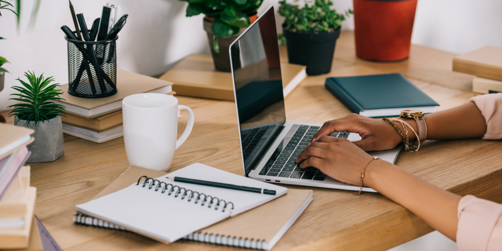 cropped image of african american businesswoman using laptop in office