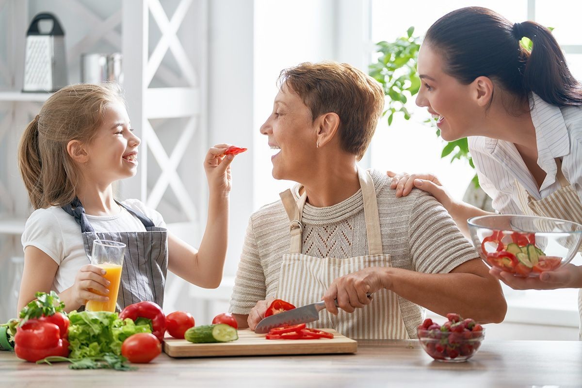 family cooking heart-healthy foods