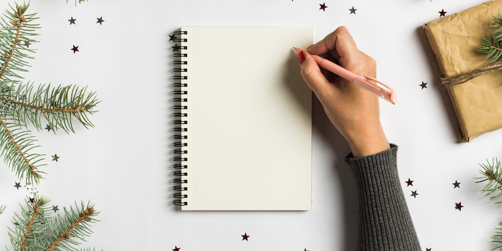 Goals plans dreams make to do list for new year christmas concept writing