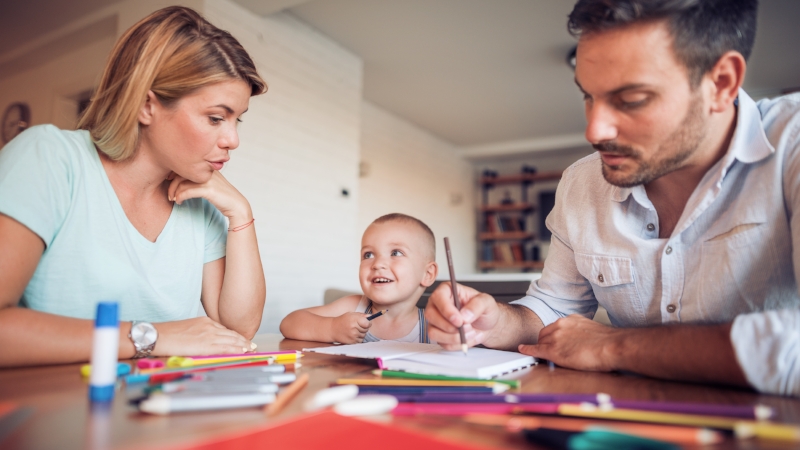 Young parent drawing with their little son.jpeg