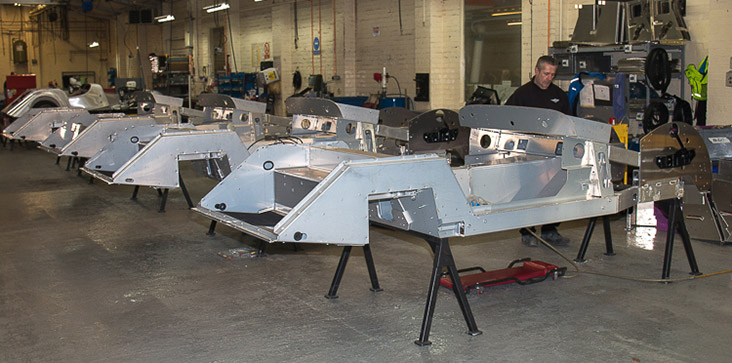 Aluminium panels are attached to the frame of the vehicle