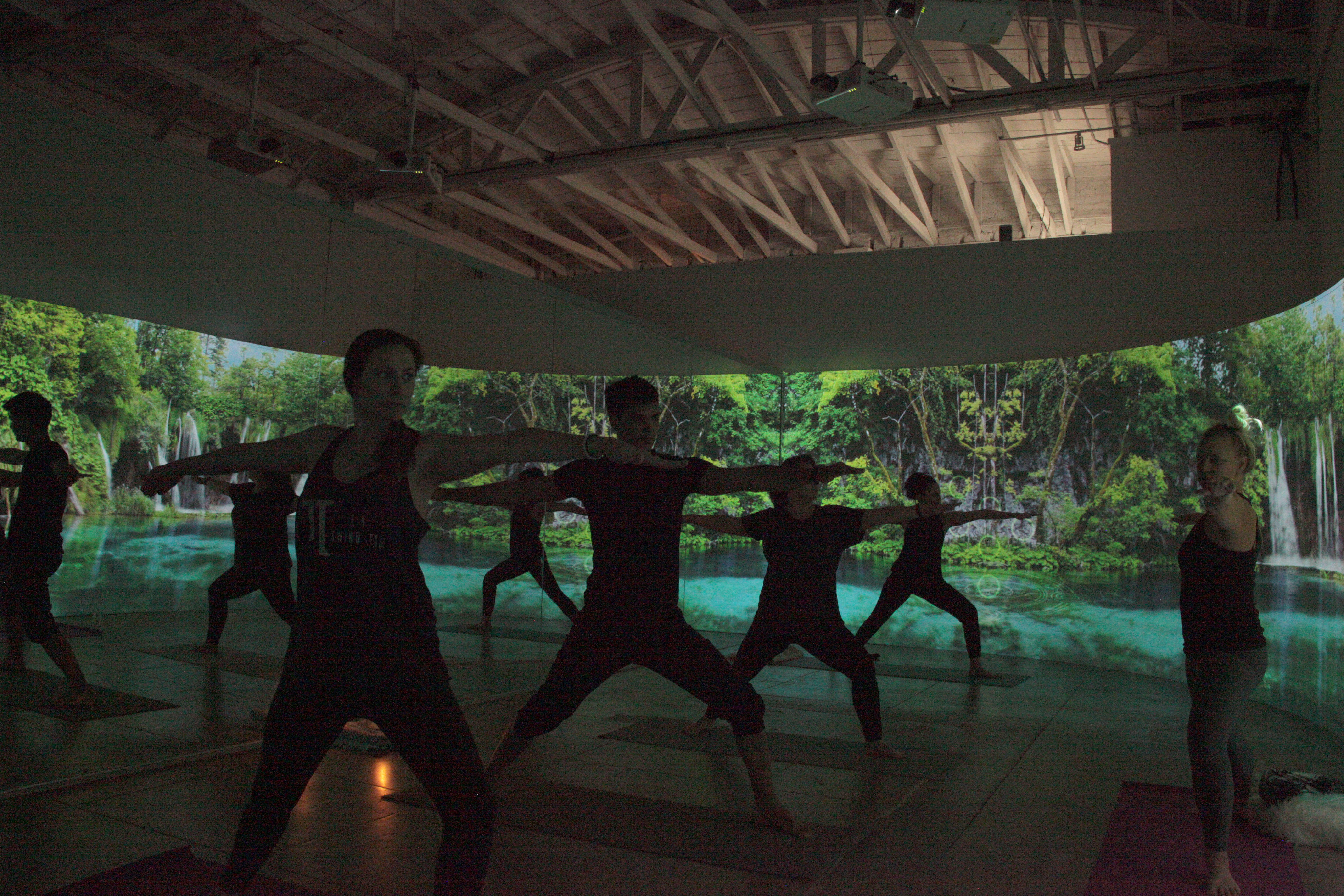 Aurora Yoga incorporates Lazer Catcher's immersive visuals