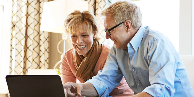 Couple looking at laptop