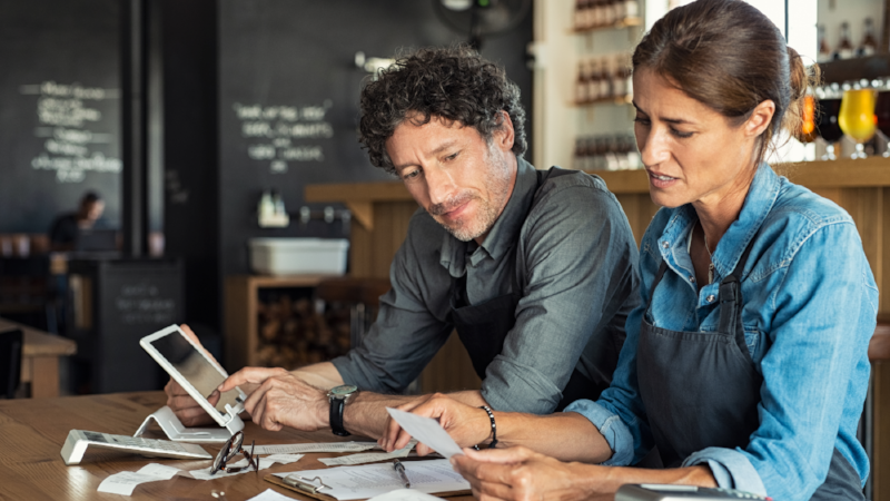 Staff calculating restaurant bill