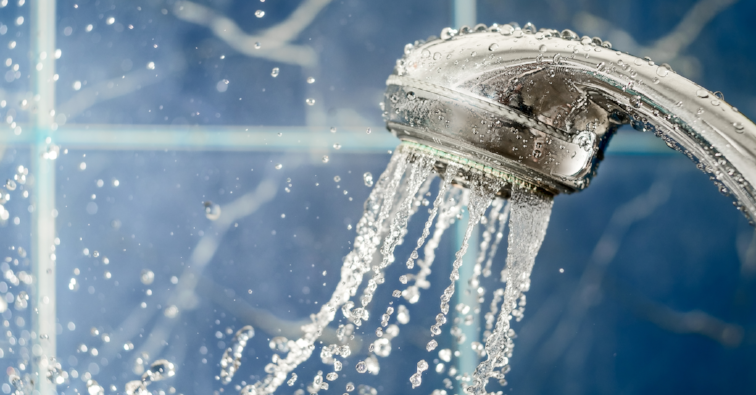 Shower head with flow of water spilling out