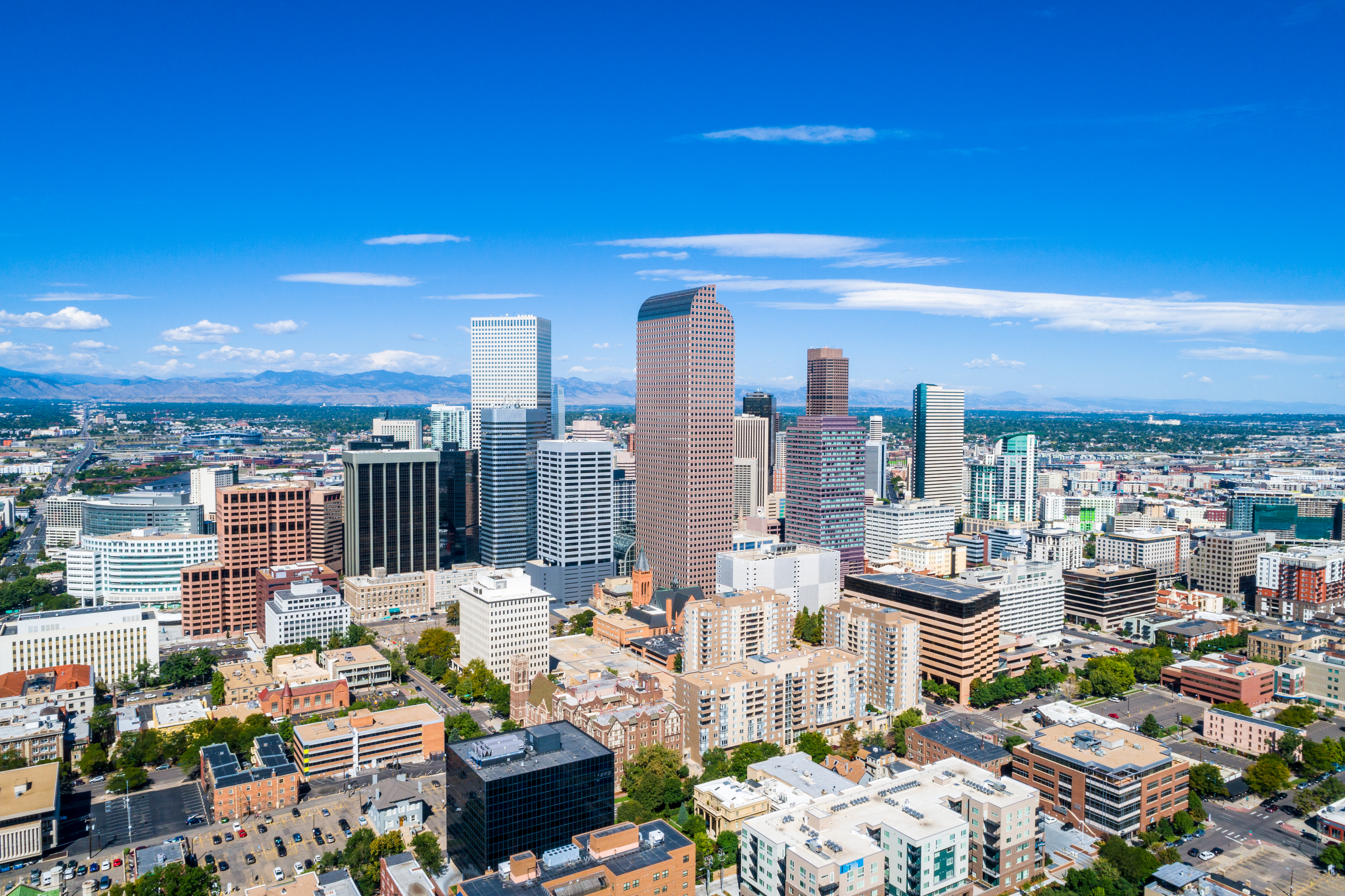 Skyscrapers rise in Rocky Mountain Front Range city of Denver Colorado skyline