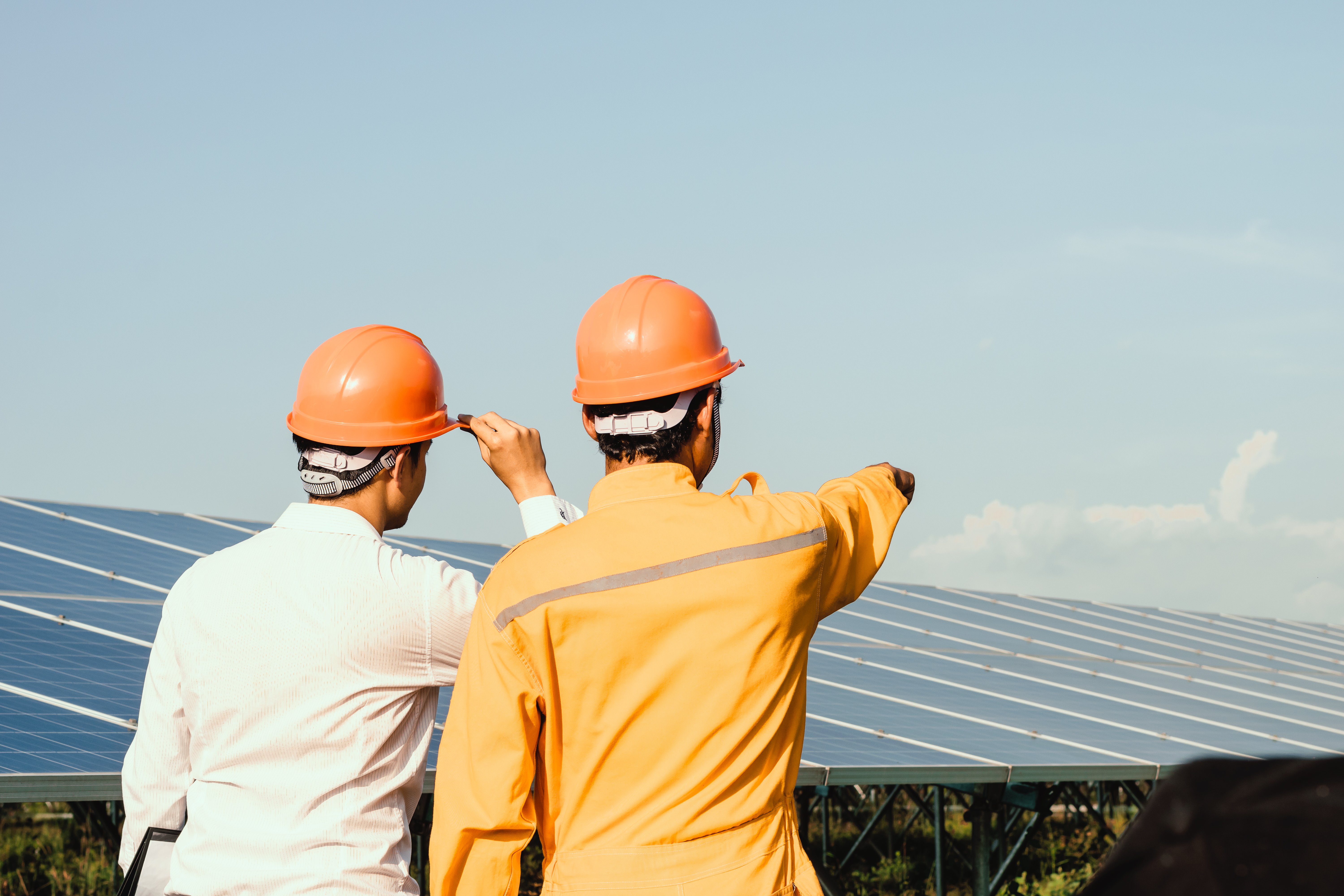 Engineers checking solar panels, Solar Energy.