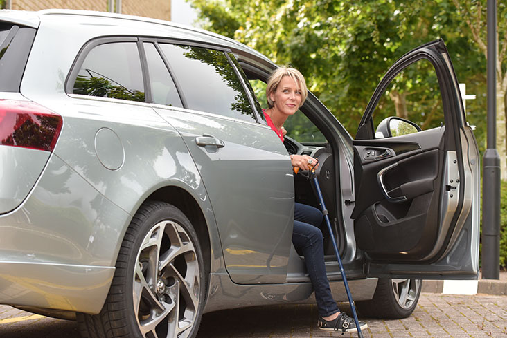 Motability Scheme customer exiting their car